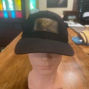 Unk Black and Gold Hat with Dog Emblem
